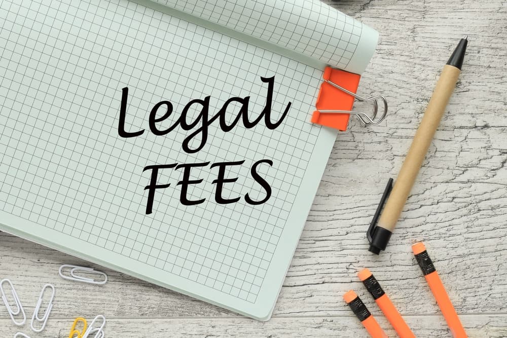 Note pad "legal fees" 