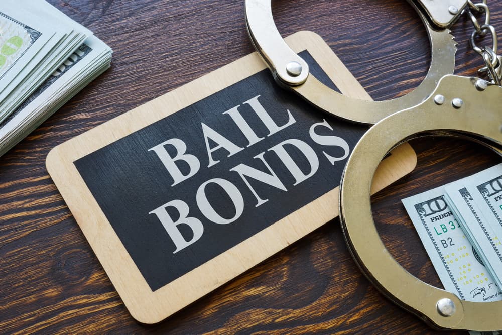 Bail bonds with handcuffs on a plate.