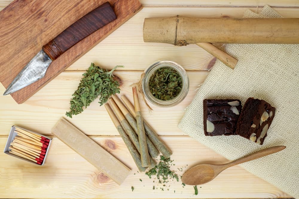 The equipment, products marijuana  on wooden background