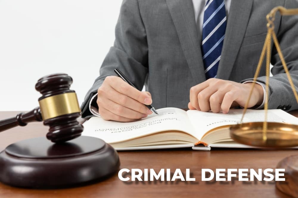 Criminal Defense Lawyer studying law book