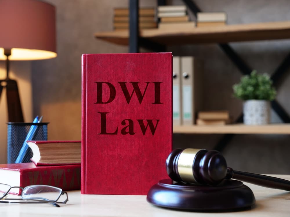 The text "Driving While Intoxicated (DWI) Law" displayed prominently, symbolizing legal information and regulations related to DWI offenses.